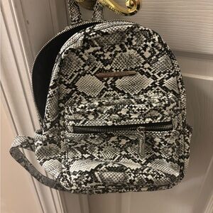 Steve Madden Black and White Snakeskin Backpack
